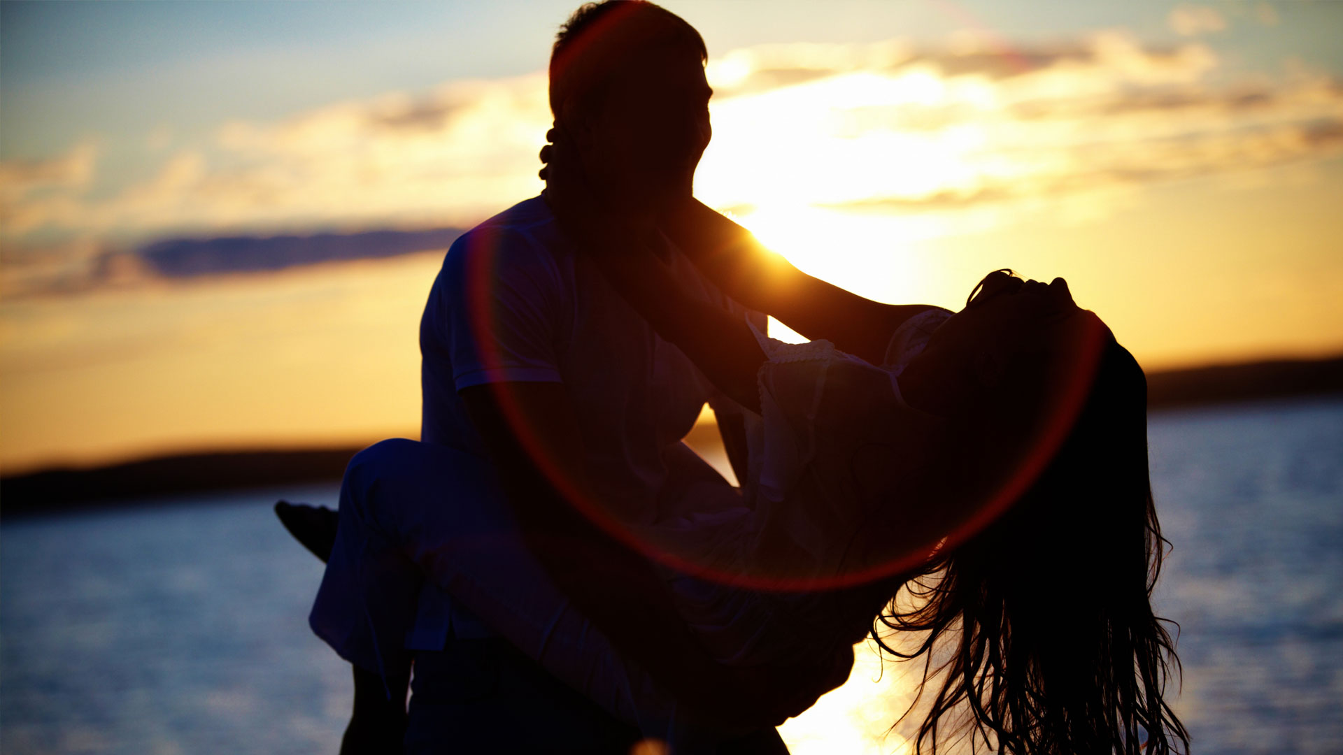 romantic man and woman embracing at Lake LBJ